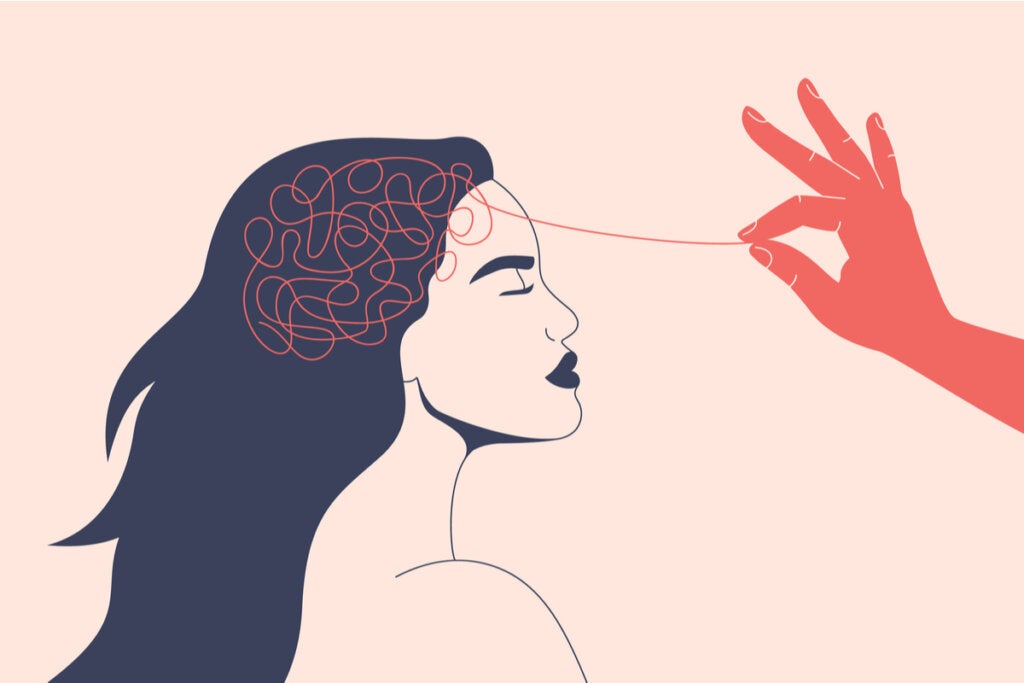 bilinçsiz kodlama sistemini sembolize etmek için kafasında iplik olan kadın